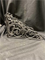 Five cast iron shelf brackets for 12 inch wide