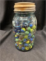 Antique blue Ball Mason quart jar full of marbles