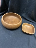 Two handmade teak bowls. Round one is 9 1/2 in.²