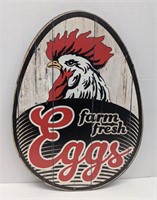 "Farm fresh eggs" printed image on wood wall