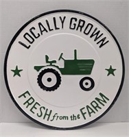 Round metal sign "Locally grown, fresh from the