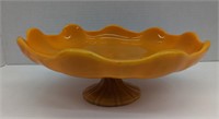 Orange glass dish. About 10.25in diameter, and