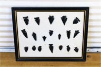 Obsideian arrowheads in display case