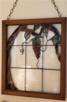 Stained glass grapes in a wooden frame
