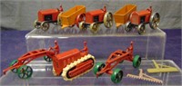 4 Early ToostieToy Tractors Pulling Trailers