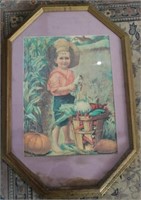 Boy with veggie basket framed