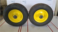 Pair of smooth lawn tractor tires.