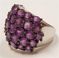 141- STERLING SILVER RING W/PURPLE STONES 5.6G