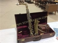 C G Conn LTD Alto saxophone in case w music,