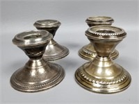 Four Weighted Sterling Silver Candle Holders