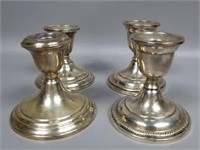 Four Weighted Sterling Silver Candle Holders