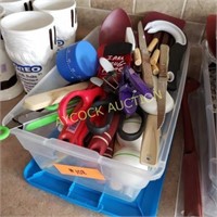 Container full of kitchen utensils