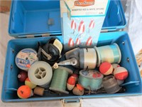 fishing supplies in blue tackle box