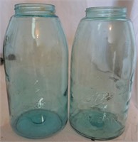 two blue 1/2 gallon jars for one money