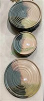 Set a 14 handmade pottery plates, seven dinner