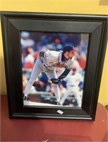 Framed photograph of Atlanta Braves pitcher,