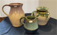 Pottery, Lot of three signed pottery pitchers,