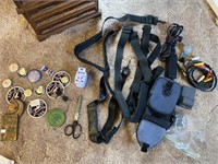 Lot of buttons, and camera straps