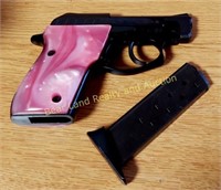 TAURUS PT25 BLUE & PINK PEARL GRIP 25 PISTOL