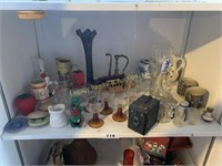 assortment of glassware, vintage camera and