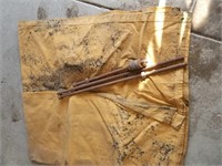 leather tarp? and 3 metal rods