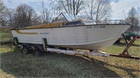 Large Starcraft boat in need of restoration.