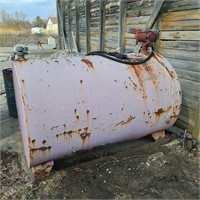 Commercial fuel tank with pump and hose.