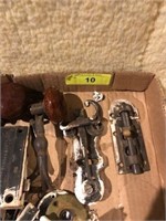 Box of antique door knobs and latches