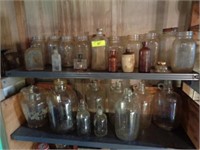 2 shelves old bottles of jars