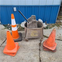 Rubbermaid mop bucket and safety cones.