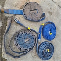 Four rolls of heavy duty 2 inch rubber hose
