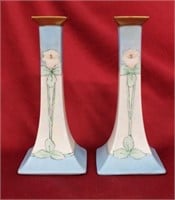 A Pair of Hand Painted Limoges Candlestands