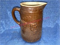 Old brown grape crock pitcher