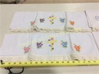7 hand embroidered pillow cases, 5 hand