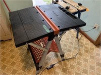 Two folding work tables