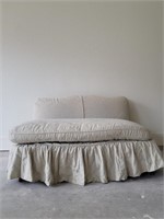 Slip Covered Armless Two-Cushion Sofa