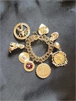 Beautiful 14K Gold Bracelet with 9 Charms