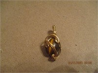 Brown Stone Wrapped in Goldtone Metal?-3.1 g