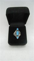 Silver colored Unmarked Ring with Blue Stones