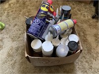 Box of caulking, spray foam, WD-40