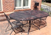 WROUGHT IRON TABLE W/ 2 WROUGHT IRON CHAIRS