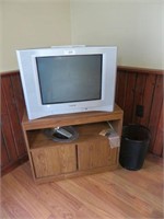 Sony television, TV stand & trash can