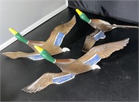 3 painted metal geese