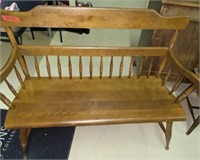 Wood bench with spindle back