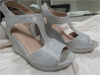 Silver Wedges. Size 7 1/2. Few Marks