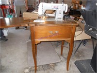 Brother sewing machine w/ button hole attach.