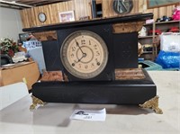 Very old ornate mantle clock with key