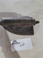 Unmarked  handle slightly bent Sad iron