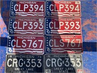 Collection of four Sets of old license plates