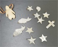 Carved Eskimo & mother of pearl charms